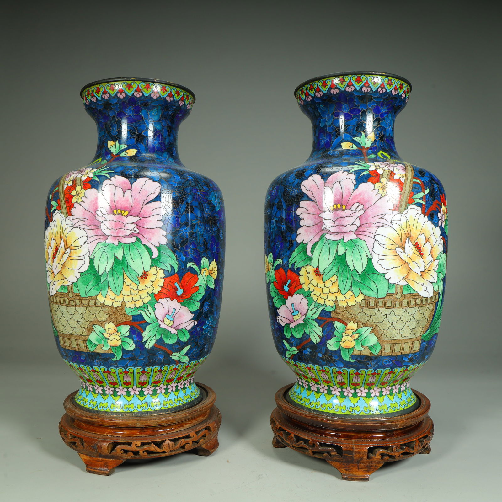 A pair of copper tire cloisonné enamel royal blue ground flower basket peony pattern bottles: Copper tire, cloisonncloisonné enamel, royal blue ground flower basket, peony pattern bottle SIZE: H: 35.5cm L: 17cm W: 17cm Total W: 3700g (The Dimensions Of All Batches Are Manually Measured.If You