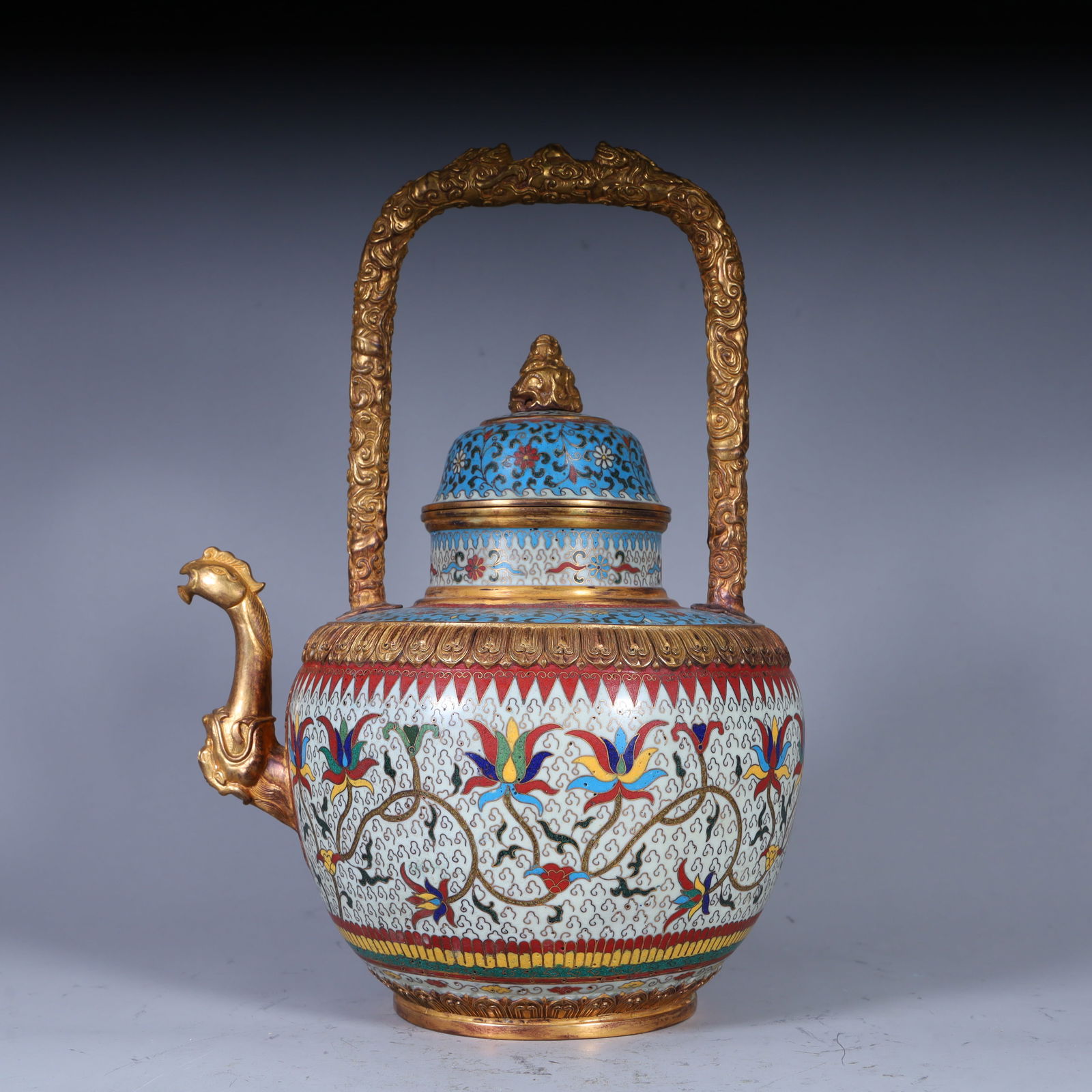 A Qing Dynasty copper tire cloisonné enamel floral pattern lifting pot: Qing Dynasty copper tire cloisonncloisonné enamel floral pattern decorated beam pot SIZE: L:22cm H:30cm W:17cm W:2.7kg (The Dimensions Of All Batches Are Manually Measured.If You Need More Detailed I