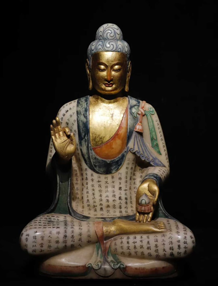 A white jade painted Buddha statue of the Northern Qi Dynasty: The hand-painted scriptures of the white jade Buddha statue of the Northern Qi Dynasty are exquisitely crafted SIZE: H: 68cm W: 46cm thickness 38cm (The Dimensions Of All Batches Are Manually