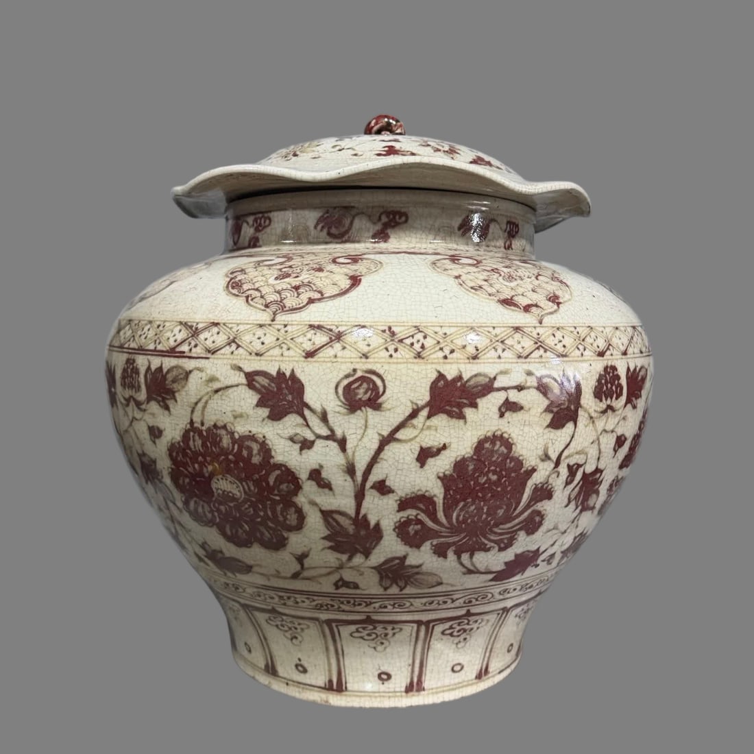 A Ming Dynasty Cizhou kiln glazed red entwined peony pattern lotus leaf lid jar (1 of 8)