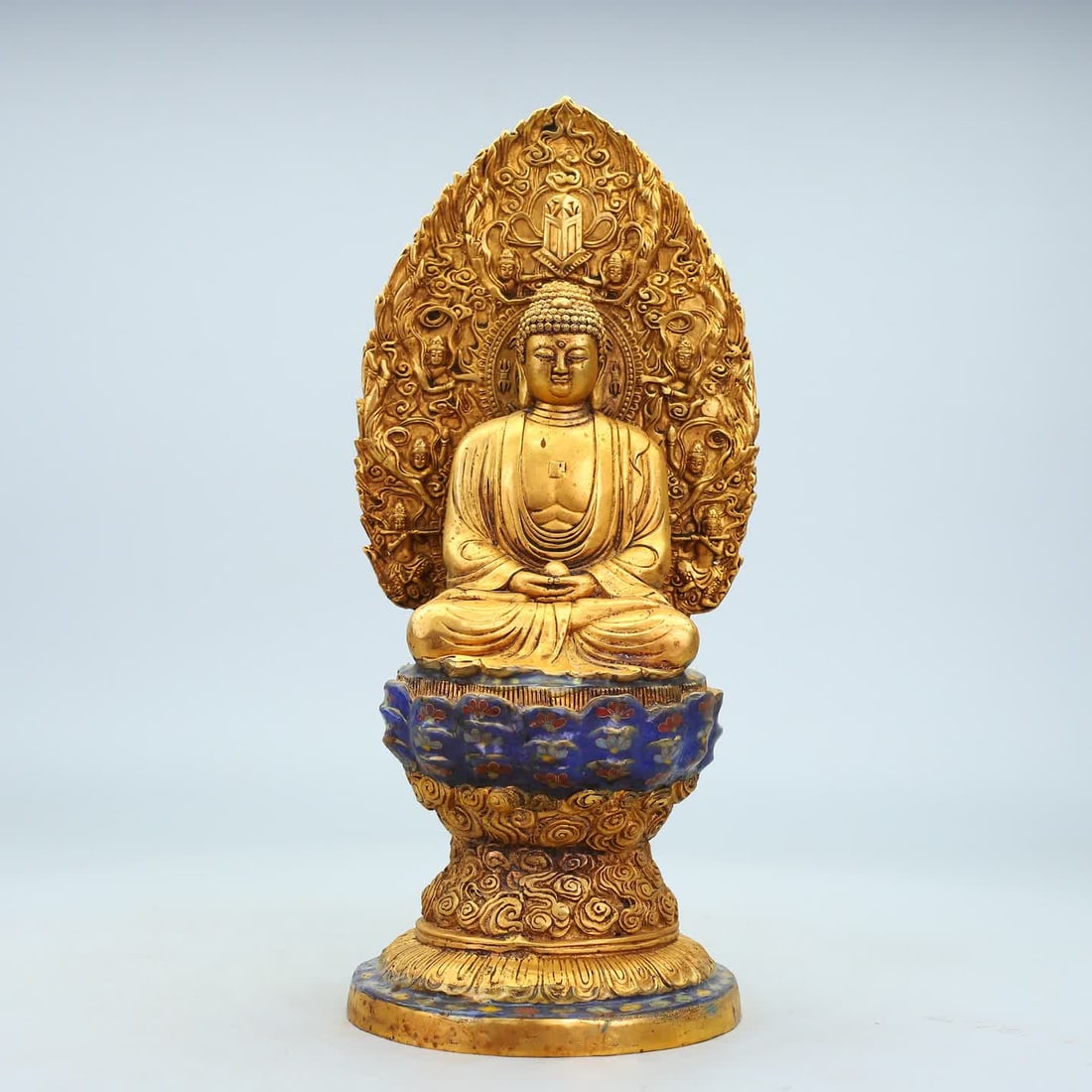 A Qing Dynasty copper-gilt cloisonné seated Buddha ornament: Qing Dynasty copper gilt cloisonné sitting Buddha ornament SIZE: H:36cm W:16cm W:3030g (The Dimensions Of All Batches Are Manually Measured.If You Need More Detailed Information, Please Contact Our
