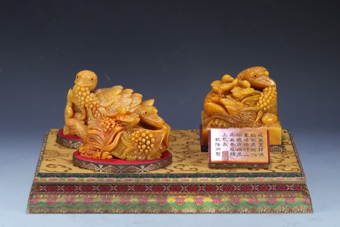 A set of Qing Dynasty Qianlong 53 imperial Shoushan field yellow goose ruyi seal: Qing Dynasty Qianlong 53 years imperial Shoushantian yellow goose ruyi seal set SIZE: 7.9x6.0x0.4cm 13.3x10.1x7.5cm 13.3x10.4x9.7cm 9.8x11.1x11.3cm W:4454g (The Dimensions Of All Batches Are Manually