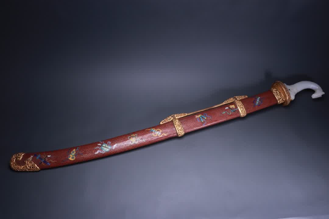 A cloisonné gilt Bogu pattern jade handle saber (1 of 9)