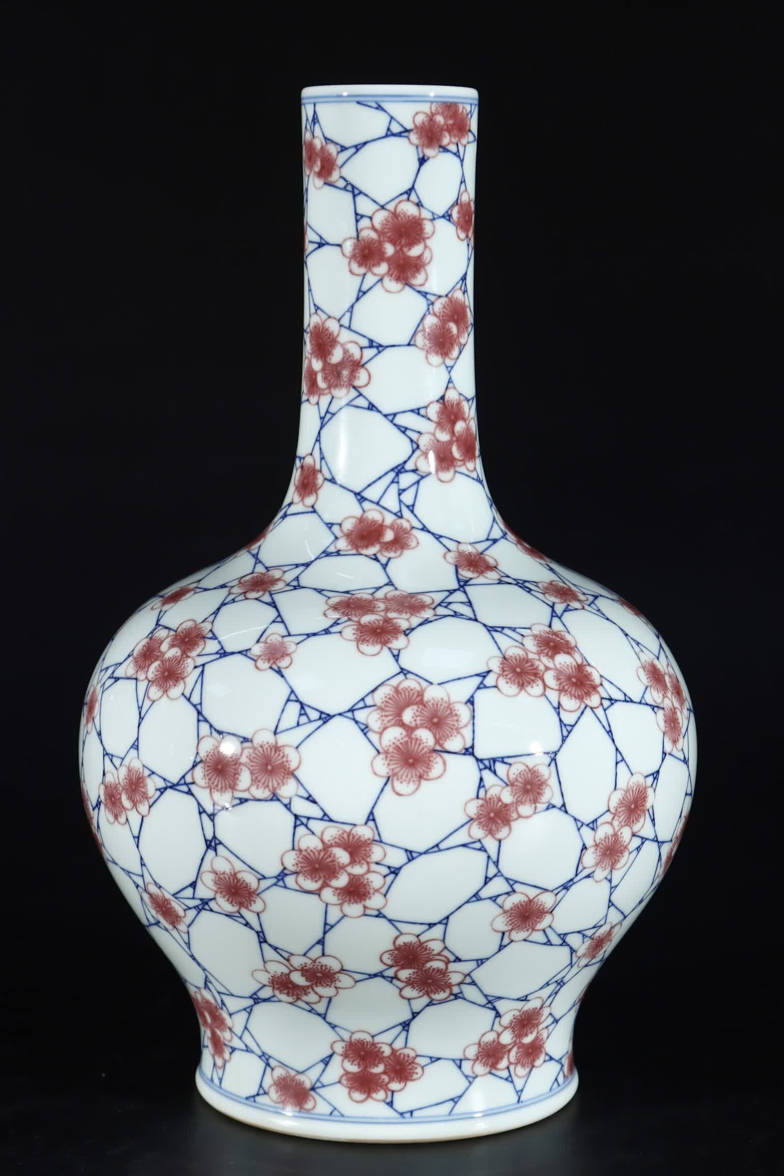 A Qing Dynasty Qianlong blue and white glaze red ice plum pattern appreciation bottle (1 of 9)