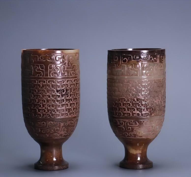 A pair of ancient jade hooked jade cups (1 of 9)