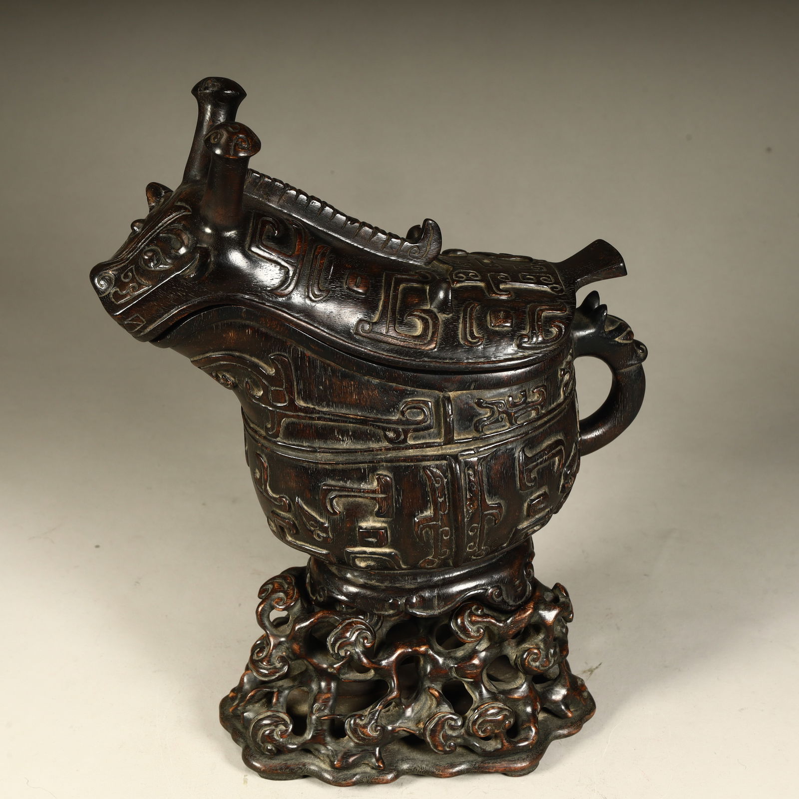 A Qing Dynasty agarwood female beast face pattern cup (1 of 12)