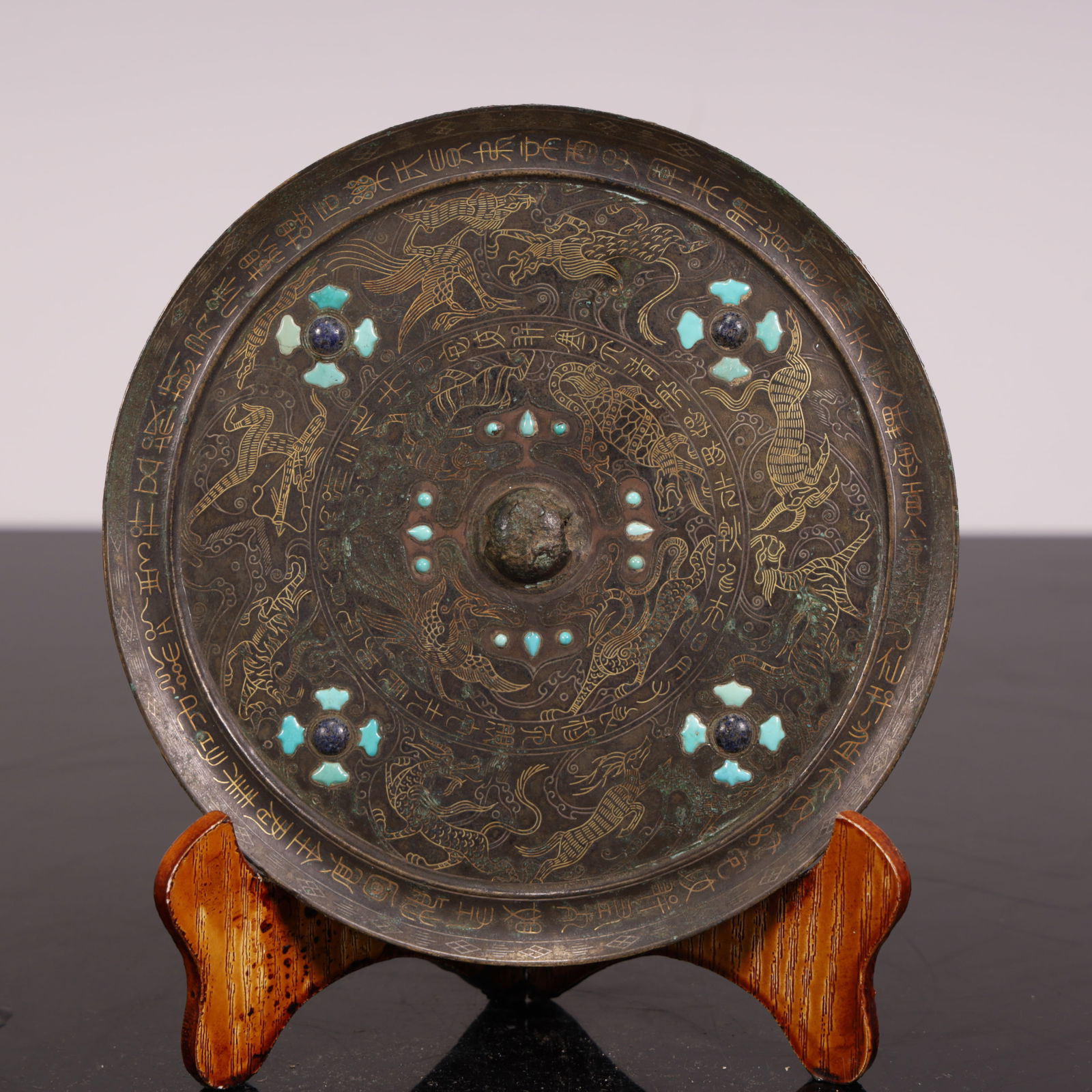 A Han Dynasty Cuo gold and silver turquoise bronze mirror (1 of 5)