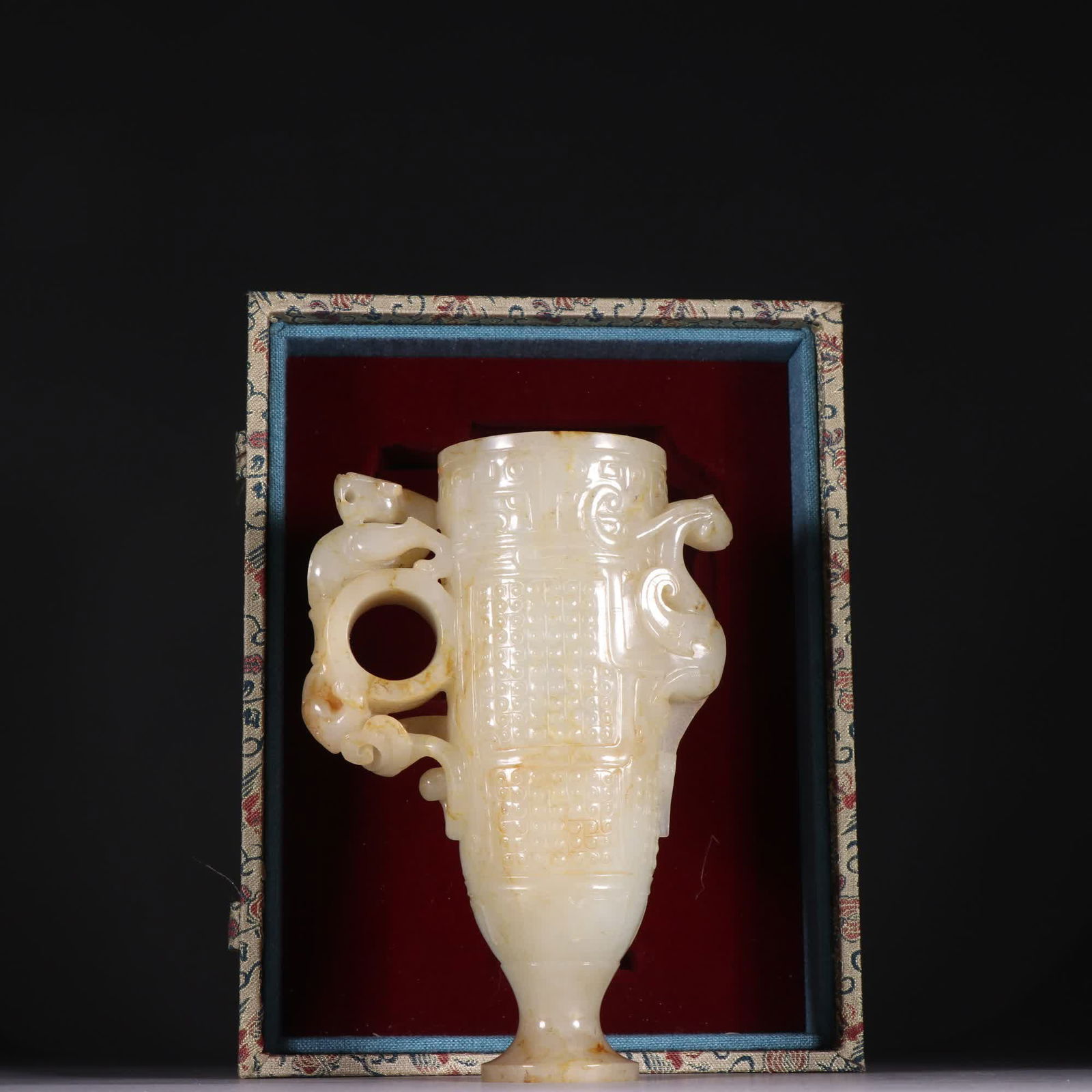 A Qing Dynasty Hetian jade high-relief dragon and phoenix pattern goblet: Qing Dynasty Hetian jade high relief dragon and phoenix pattern goblet SIZE: H:14.7cm W:10.3cm W:367.2g (The Dimensions Of All Batches Are Manually Measured.If You Need More Detailed Information, Plea