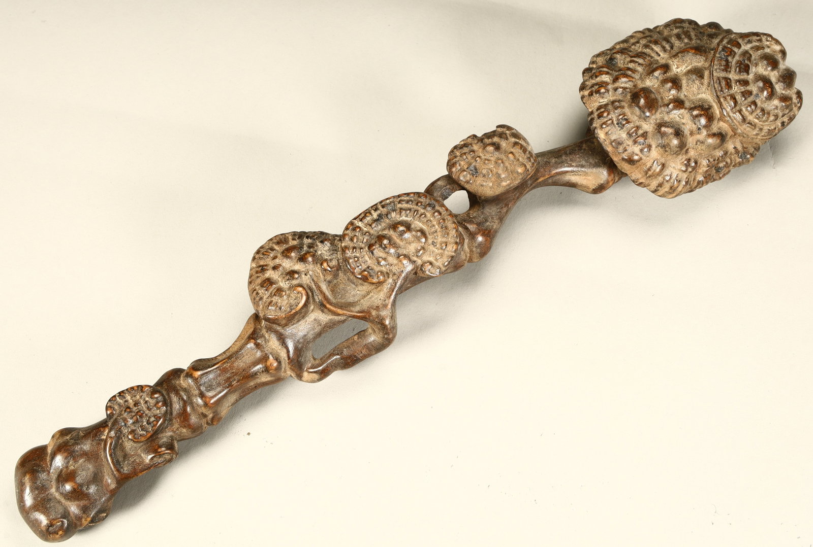 A Qing Dynasty boxwood wood carving Ganoderma lucidum pattern ruyi: Qing Dynasty boxwood wood carving Ganoderma lucidum pattern Ruyi SIZE: SIZE: L:30cm W:6cm W:130g (The Dimensions Of All Batches Are Manually Measured.If You Need More Detailed Information, Please Cont