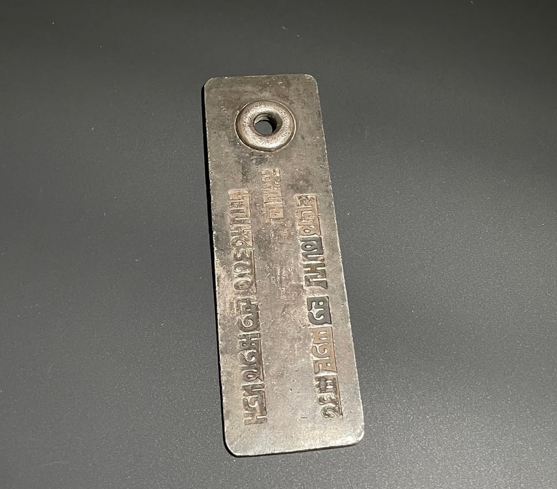 A pre-owned silver token - 2