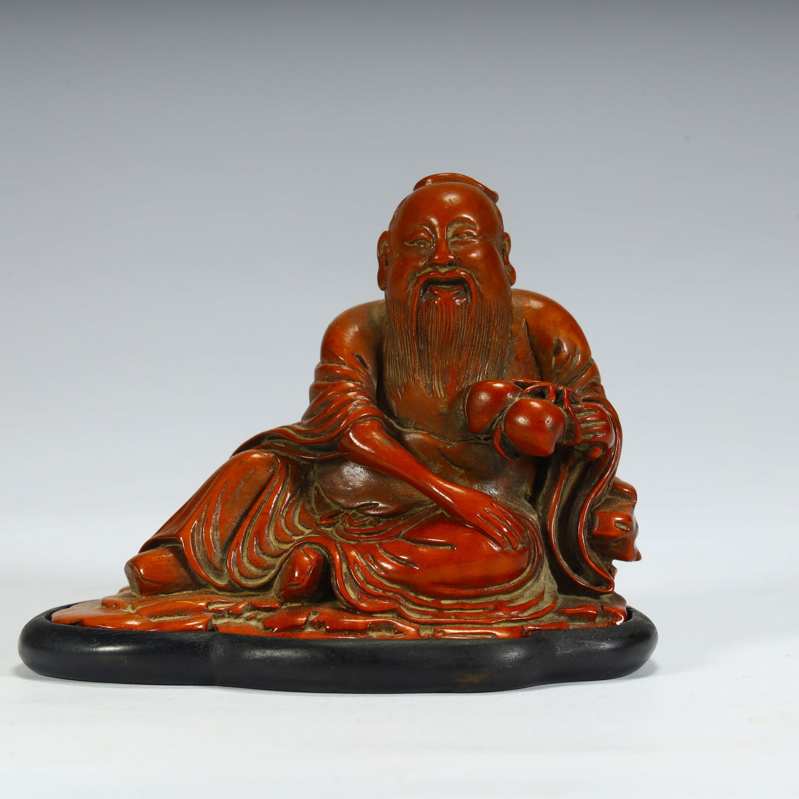 A Qing Dynasty boxwood carving birthday star seated statue: Qing Dynasty boxwood carving birthday star seated statue SIZE: H:7.5cm L:9cm W:6cm W:86.8g (The Dimensions Of All Batches Are Manually Measured.If You Need More Detailed Information, Please Contact Ou