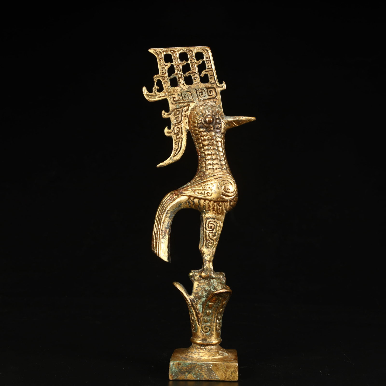 A Sanxingdui style copper-gilt divine bird statue: Sanxingdui style copper gilt divine bird statue SIZE: H:14cm L:8.5cm W:4.5cm W:515g (The Dimensions Of All Batches Are Manually Measured.If You Need More Detailed Information, Please Contact Our Custo