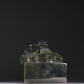 A Qing Dynasty jasper dragon button seal