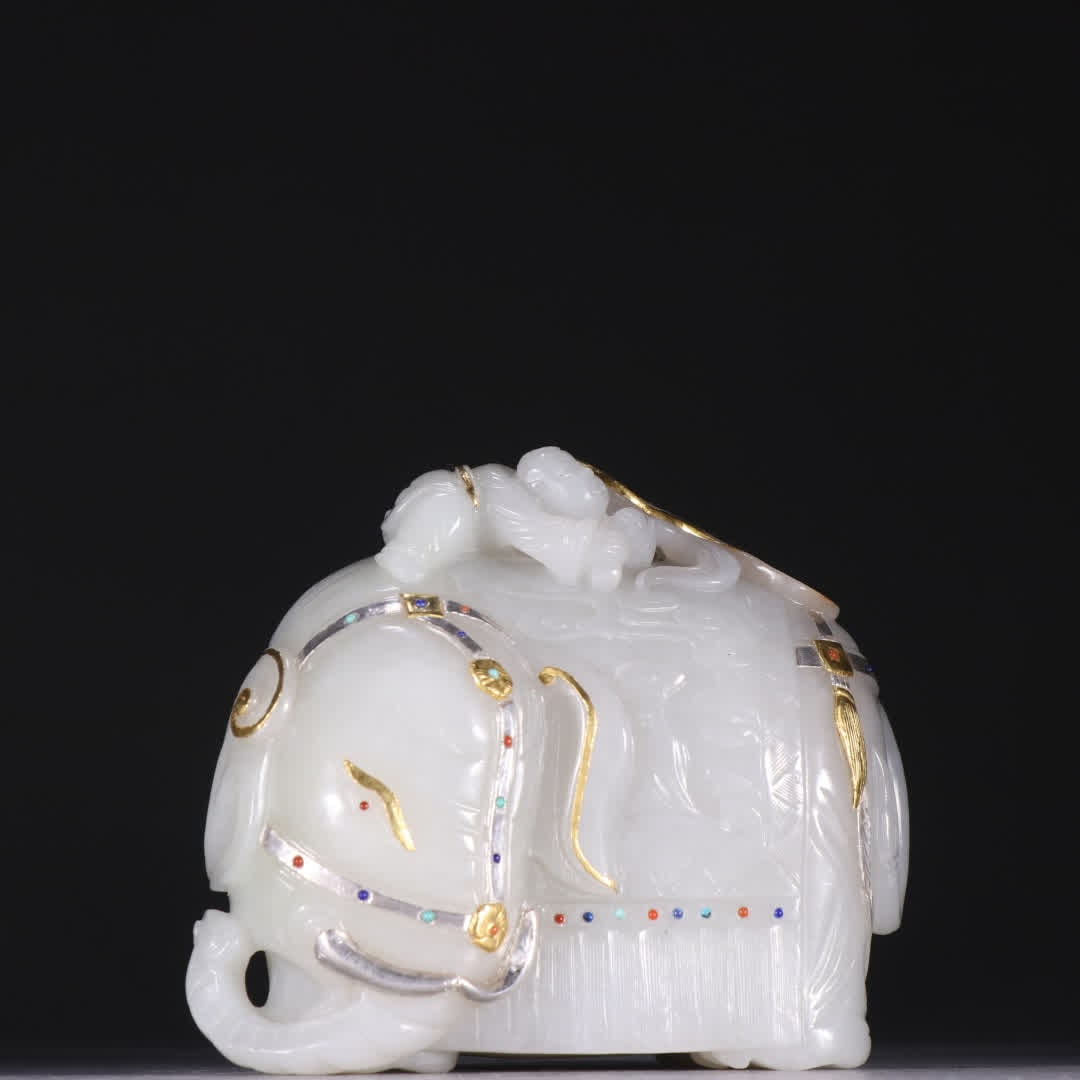 A Qing Dynasty Hetian jade inlaid gold and silver elephant ornament: Qing Dynasty Hetian jade inlaid gold and silver elephant ornaments SIZE: H:8.9cm W:10.9cm W:986g (The Dimensions Of All Batches Are Manually Measured.If You Need More Detailed Information, Please Cont