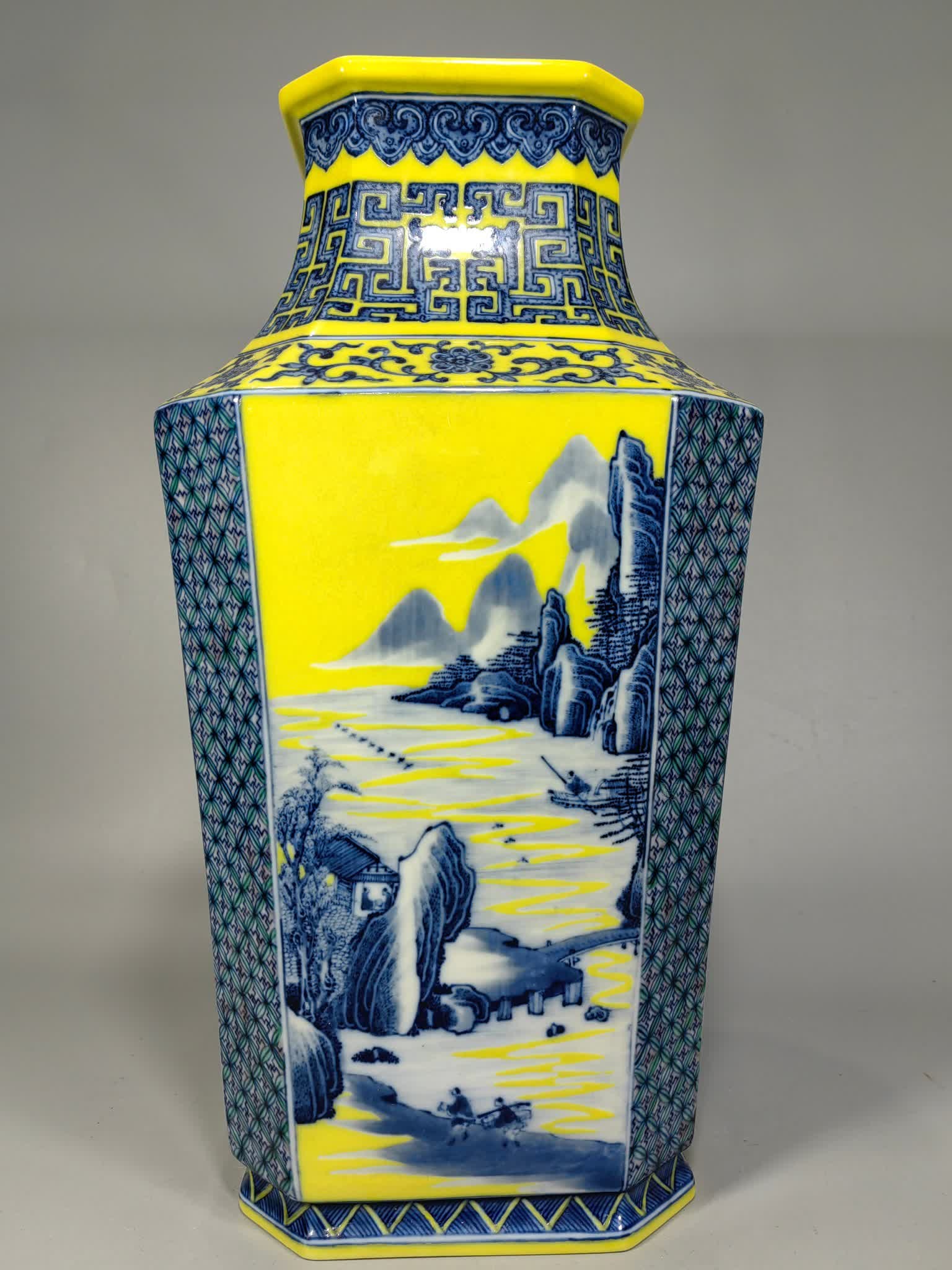 A Qing Dynasty blue and white square landscape water bottle with a yellow background: Qing Dynasty yellow background blue and white square landscape water bottle SIZE: H:39cm W:20cm (The Dimensions Of All Batches Are Manually Measured.If You Need More Detailed Information, Please Conta