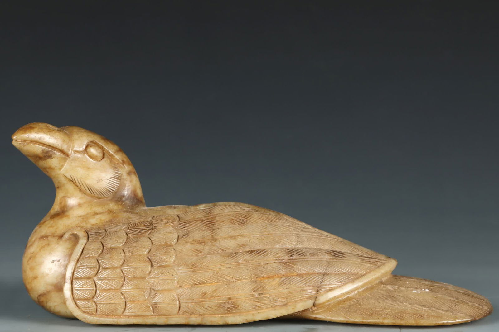 A Qing Dynasty Hetian jade beast ornament: Qing Dynasty Hetian jade beast guard ornament SIZE: W:1476g H:9.5cm W:22cm (The Dimensions Of All Batches Are Manually Measured.If You Need More Detailed Information, Please Contact Our Customer Servi