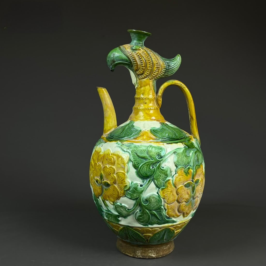 A Liao Sancai carved flower pattern phoenix head pot: Liao Sancai carved flower pattern phoenix head pot SIZE: H:31cm W:17cm (The Dimensions Of All Batches Are Manually Measured.If You Need More Detailed Information, Please Contact Our Customer Service B