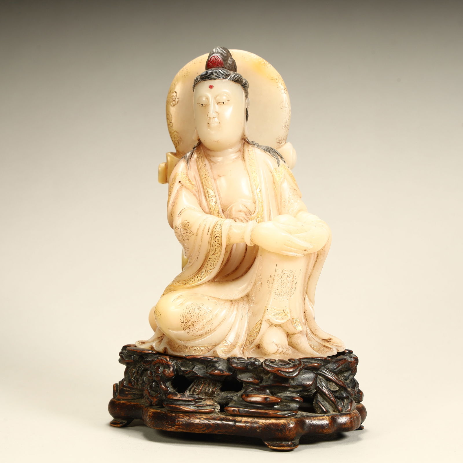 A seated statue of Guanyin in Shoushan stone: Shoushan stone carving Guanyin seated statue SIZE: H:14cm L:10cm W:6.5cm W:445g (The Dimensions Of All Batches Are Manually Measured.If You Need More Detailed Information, Please Contact Our Customer