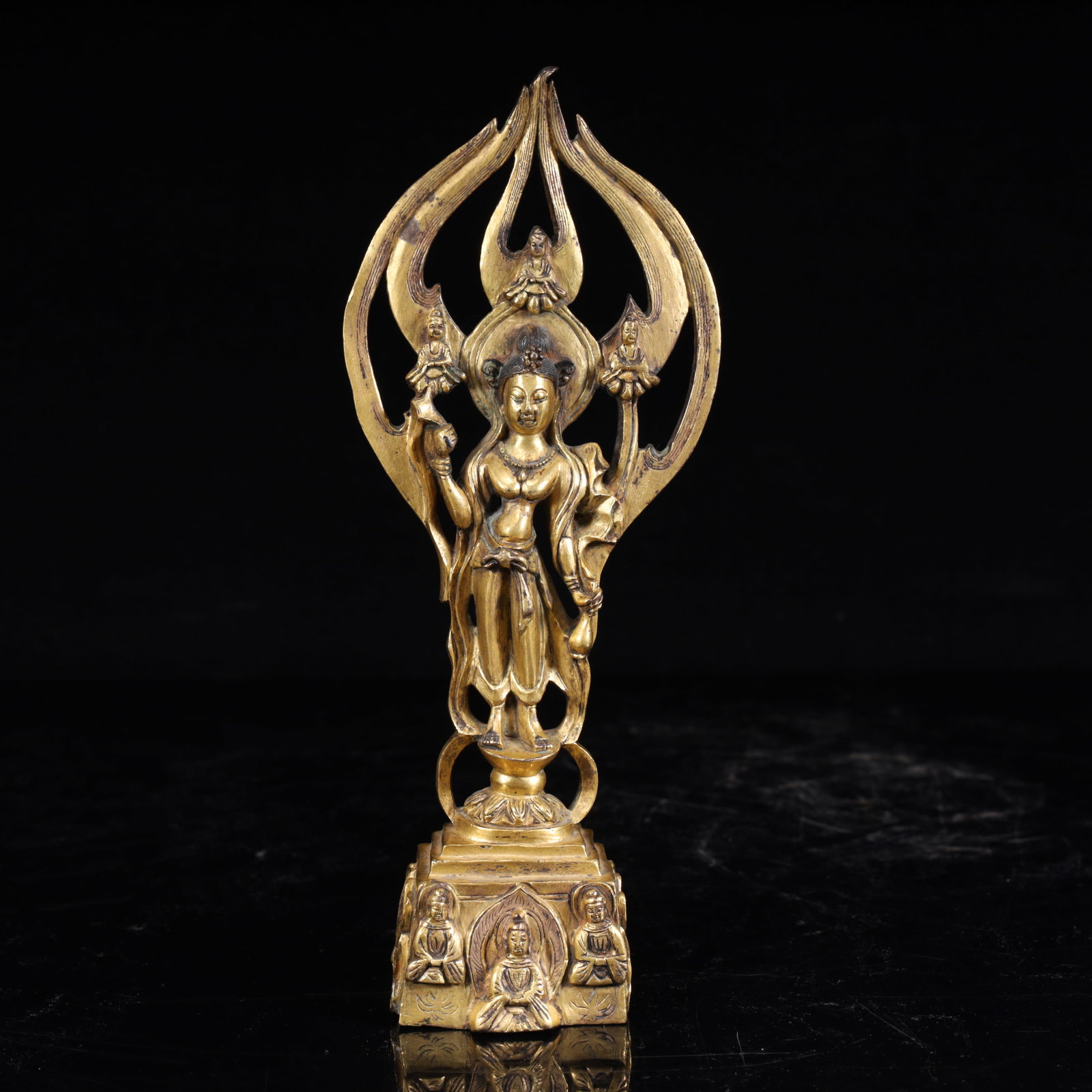 A piece of copper tire gilded, shaped as a standing statue of Guanyin, backlit with small Buddha: Copper tire gilded, shaped as a standing statue of Guanyin, backlit with small Buddha statues, and cast Buddha statues on the base, exquisite craftsmanship, is an outstanding representative of the Bud