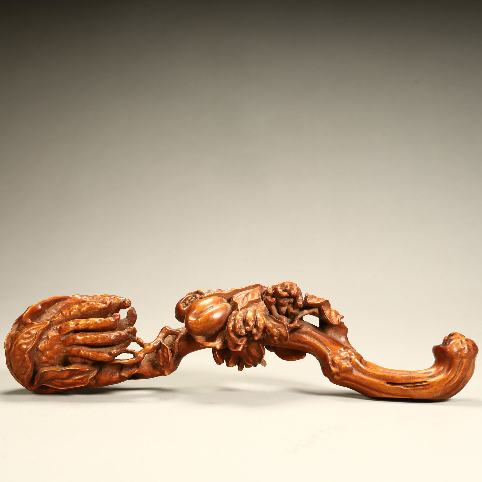 A Qing Dynasty boxwood carving with three multi-pattern ruyi: Qing Dynasty boxwood carving three multi-pattern ruyi SIZE: H:4cm L:10cm W:5cm W:122.6g (The Dimensions Of All Batches Are Manually Measured.If You Need More Detailed Information, Please Contact Our C