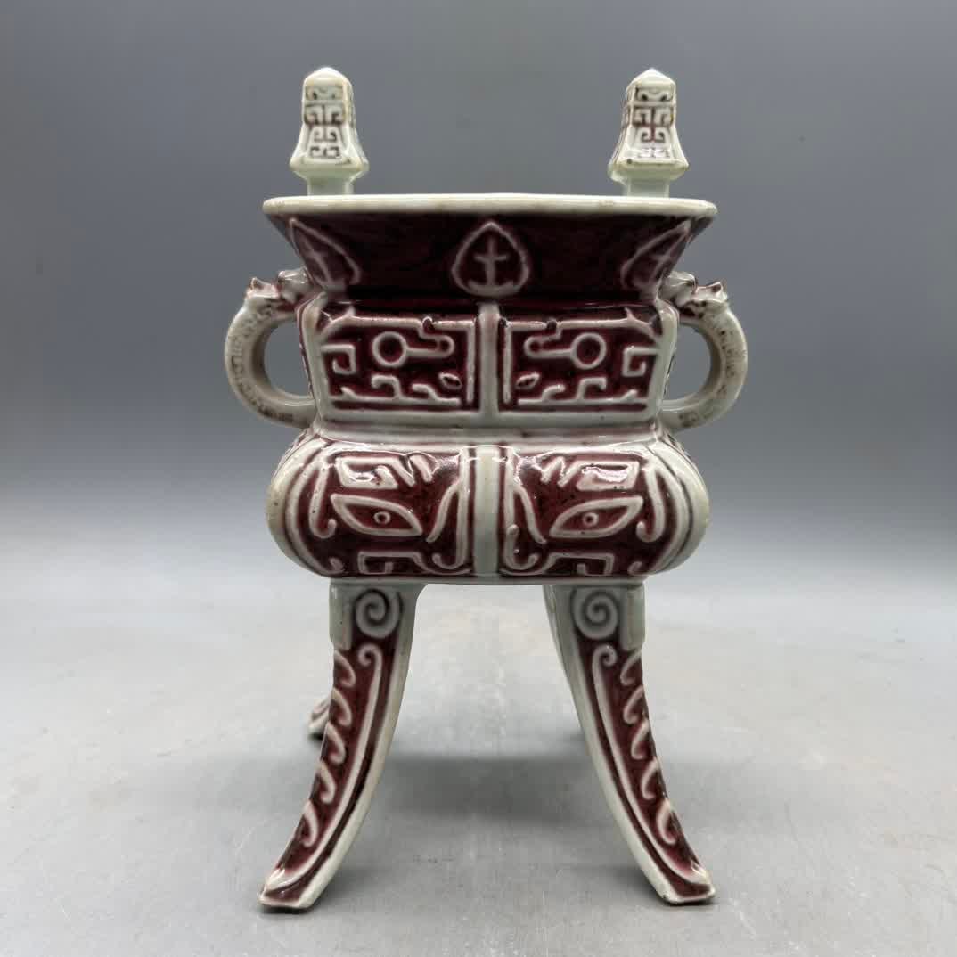 A Qing Dynasty glazed red four-legged incense burner: Qing Dynasty glazed red four-legged incense burner SIZE: H:25cm W:14cm (The Dimensions Of All Batches Are Manually Measured.If You Need More Detailed Information, Please Contact Our Customer Service B