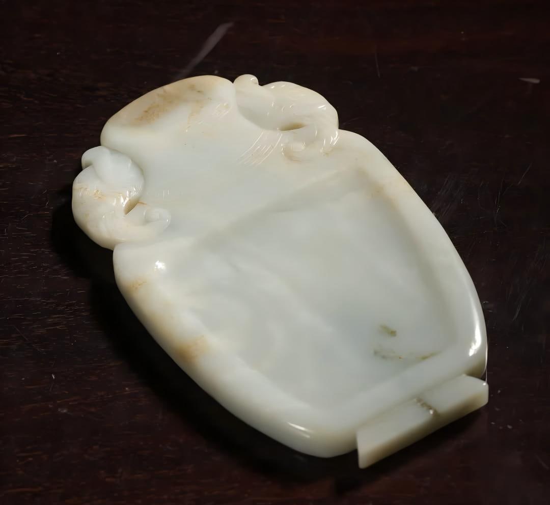 A piece of Qing Dynasty Hetian white jade carving Taiping has an elephant study room inkstone: Qing Dynasty Hetian white jade carving Taiping has a hive, study, and inkstone SIZE: L:16cm W:9.5cm T:1.5cm W:426g (The Dimensions Of All Batches Are Manually Measured.If You Need More Detailed Inform