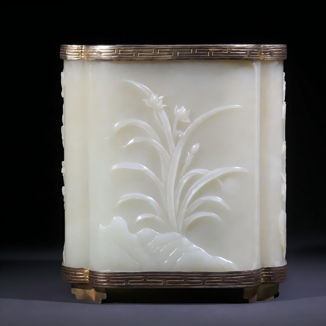A Qing Dynasty white jade four gentlemen pen holder (silver gilt edging): Qing Dynasty White Jade Four Gentlemen Pen Holder (silver gilt edging) Hetian white jade whole material carving, jade is warm and shiny, hexagonal shape is regular, the air mouth is along the bottom f
