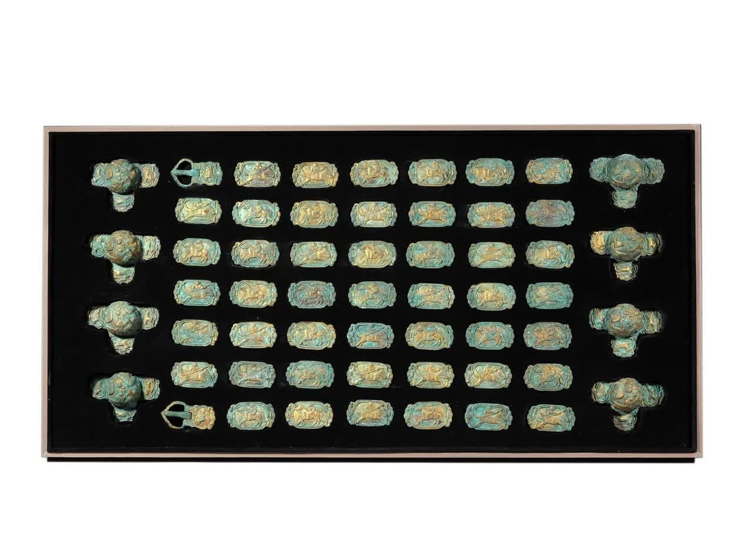 A piece of Liao Dynasty copper gilt harness belt decoration single piece long: Liao Dynasty copper gilt harness belt decoration SIZE: L:6cm W:3.5cm (The Dimensions Of All Batches Are Manually Measured.If You Need More Detailed Information, Please Contact Our Customer Service Bef