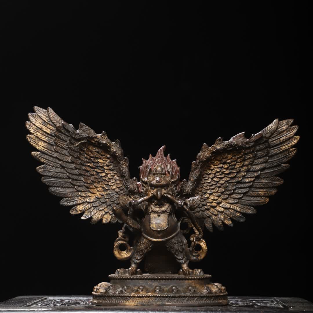 A Qing Dynasty copper clay gold roc Buddha statue: Qing Dynasty copper clay gold Dapeng Buddha statue SIZE: H:25cm W:37cm T:9.5cm W:2.6kg (The Dimensions Of All Batches Are Manually Measured.If You Need More Detailed Information, Please Contact Our Cu