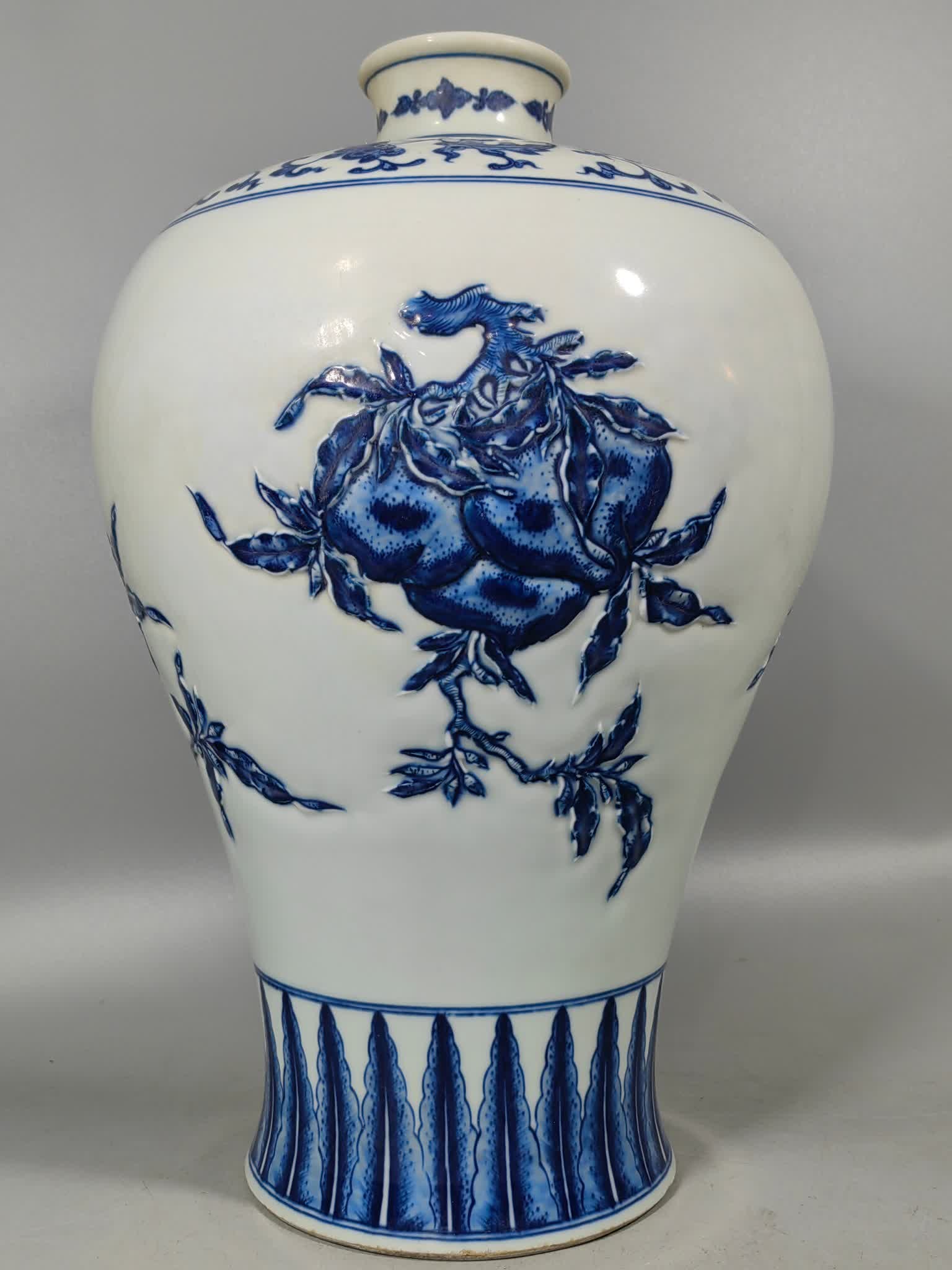 A Qing Dynasty pile carved three blue and white plum vases: In the Qing Dynasty, there were three blue and white plum vases SIZE: H:37.5cm W:26.5cm (The Dimensions Of All Batches Are Manually Measured.If You Need More Detailed Information, Please Contact Our C