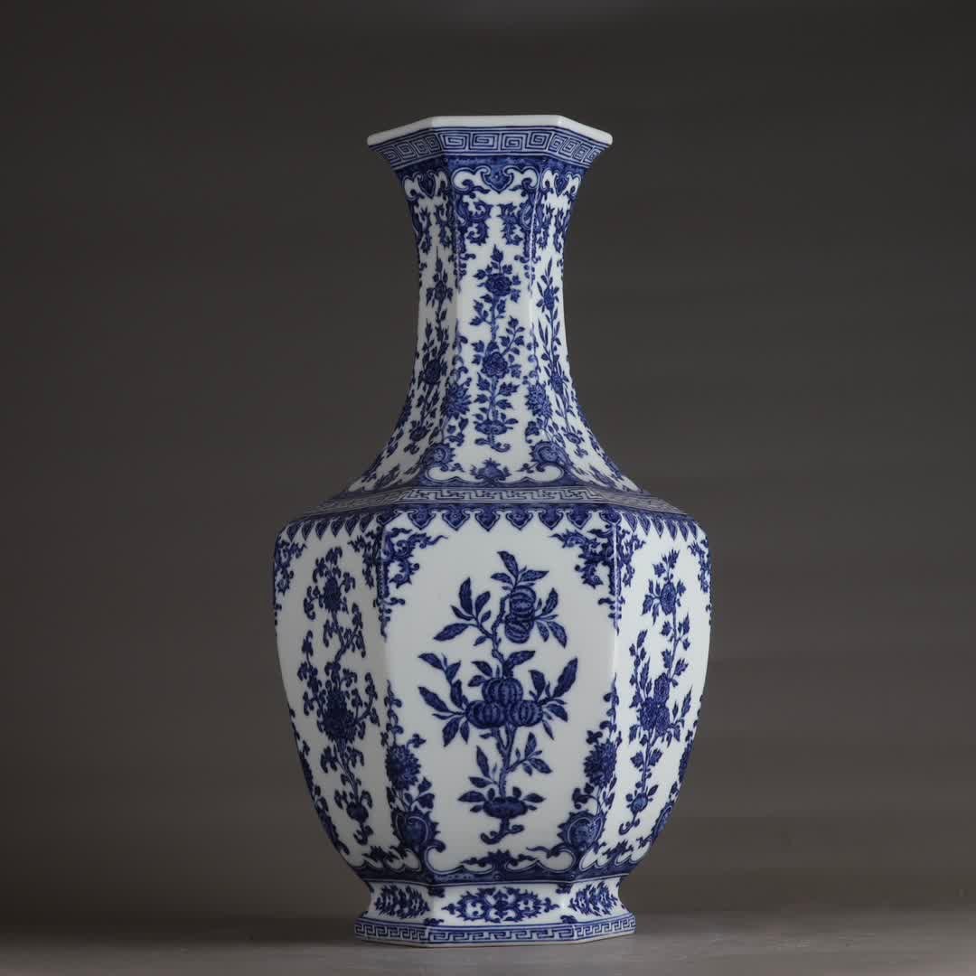 A six-way incense vessel with a window opening of a blue and white entwined lotus in the Qing: Qing Qianlong blue and white entwined lotus window hexagonal incense vessel SIZE: H: 46.6cm Belly diameter 25cm (The Dimensions Of All Batches Are Manually Measured.If You Need More Detailed Informati