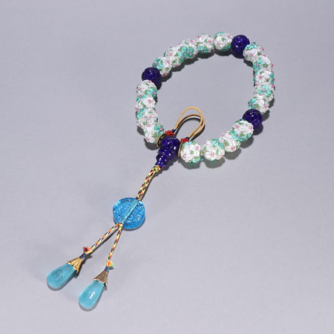 A piece of Qing Dynasty glass pile flower eighteen sons held: Qing Dynasty Eighteen sons of glass pile flowers are held SIZE: Bead diameter 1.6cm W: 111.3g (The Dimensions Of All Batches Are Manually Measured.If You Need More Detailed Information, Please Contact