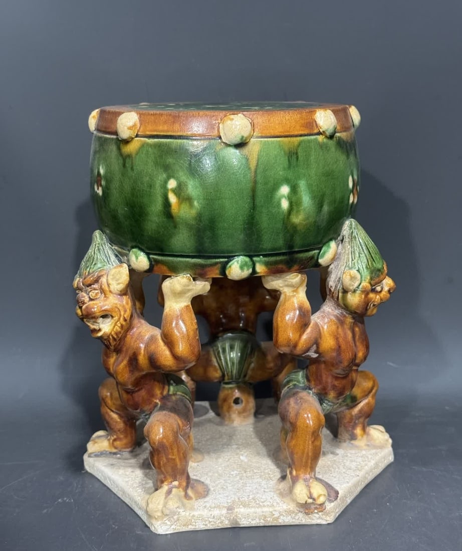 A Tang Sancai wrestler drum: Tang Sancai wrestler drums SIZE: H:20cm W:15cm (The Dimensions Of All Batches Are Manually Measured.If You Need More Detailed Information, Please Contact Our Customer Service Before Bidding.)