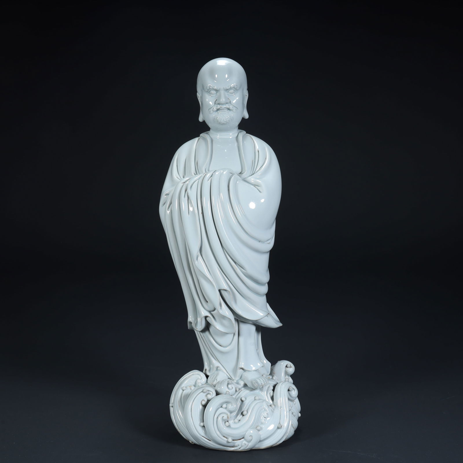 One by one, a statue of Dehua white porcelain Bodhidharma crossing the river: A statue of Dehua white porcelain Bodhidharma crossing the river SIZE: H:34.5cm L:13cm W:11cm W:2.4kg (The Dimensions Of All Batches Are Manually Measured.If You Need More Detailed Information, Please
