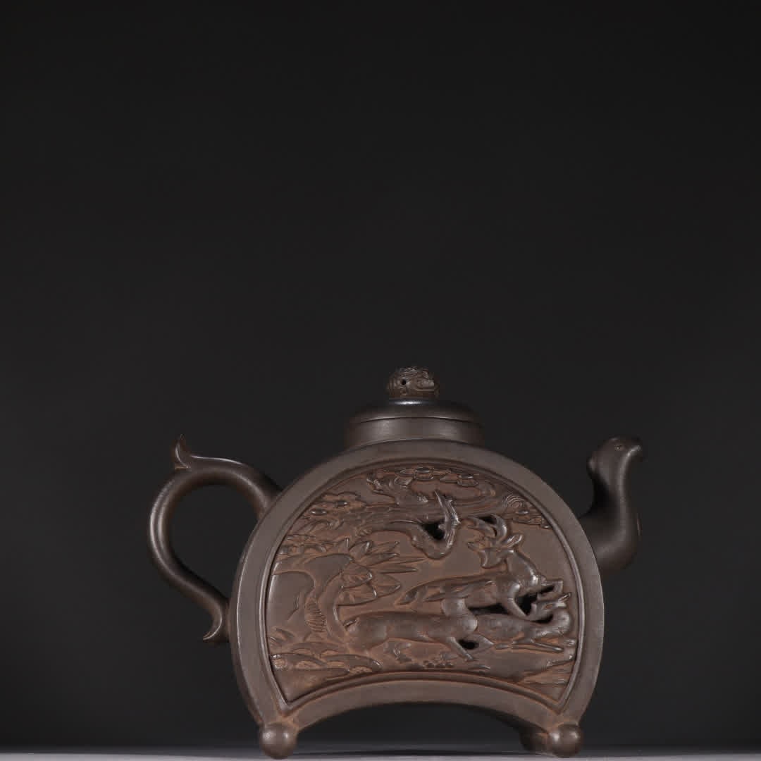 A Qing Dynasty purple sand "pine crane longevity" teapot: Qing Dynasty purple sand "pine crane longevity" teapot SIZE: H:15cm W:19cm (The Dimensions Of All Batches Are Manually Measured.If You Need More Detailed Information, Please Contact Our Customer Servi