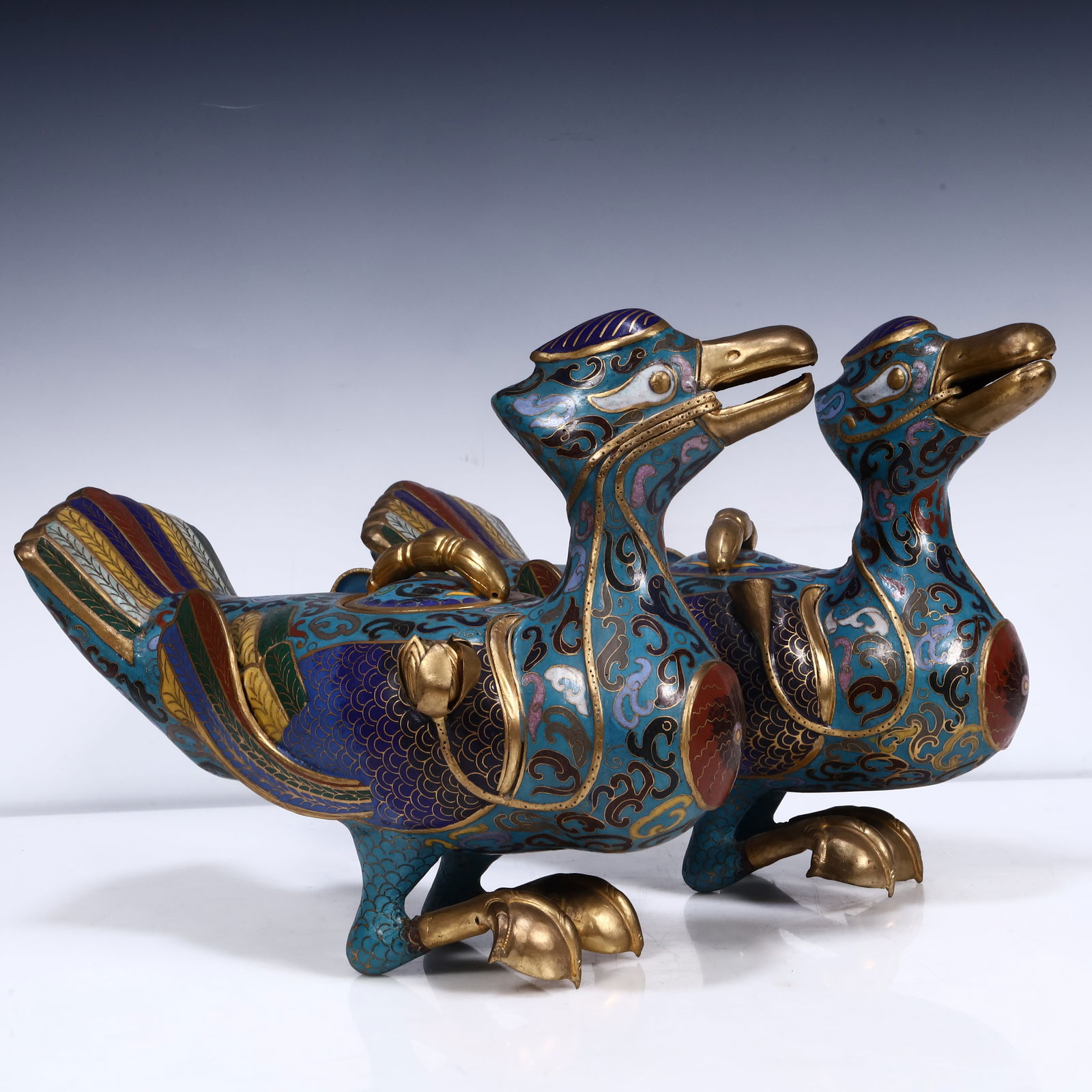 A cloisonné duck: cloisonné duck SIZE: L:25cm W:10cm H:15cm W:2.8kg (The Dimensions Of All Batches Are Manually Measured.If You Need More Detailed Information, Please Contact Our Customer Service Before Bidding.)