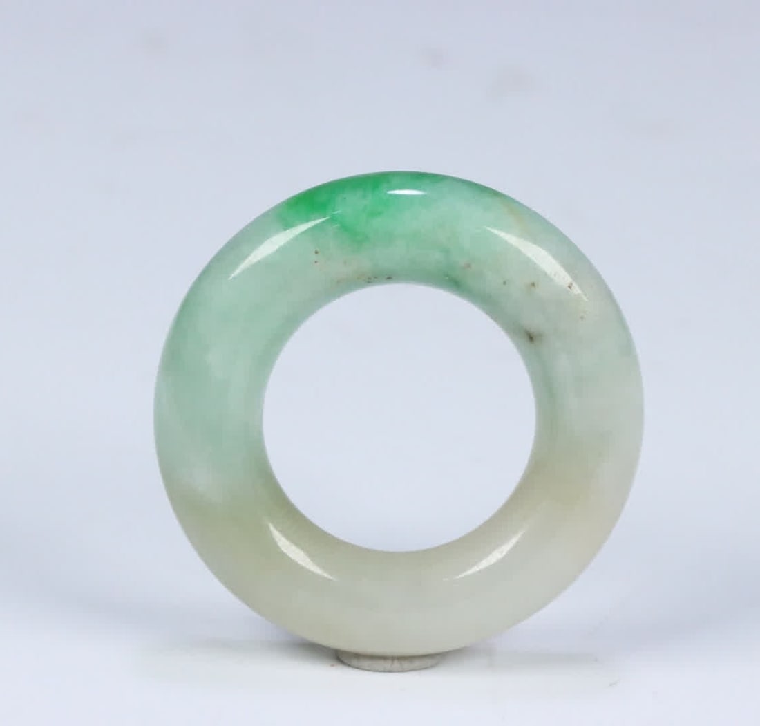 A Qing Dynasty old jadeite plain pattern cassock ring: Qing Dynasty old jade plain pattern cassock ring SIZE: 4.43x2.5x1.08cm W:28.5g (The Dimensions Of All Batches Are Manually Measured.If You Need More Detailed Information, Please Contact Our Customer S