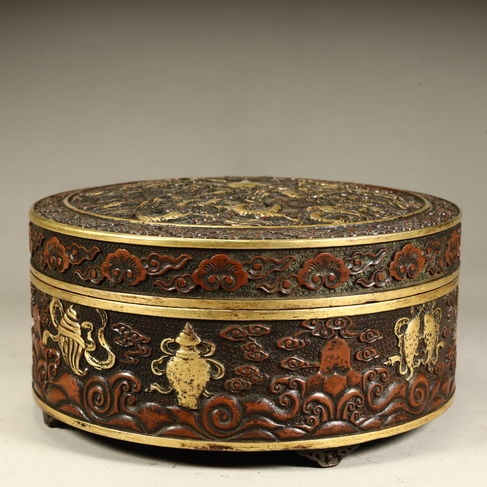 A Ming Dynasty copper gilt relief dragon pattern eight treasure lid box: Ming Dynasty copper gilt relief dragon pattern eight treasure lid box SIZE: H:8.5cm L:20cm W:20cm W:5.9kg (The Dimensions Of All Batches Are Manually Measured.If You Need More Detailed Information, Pl