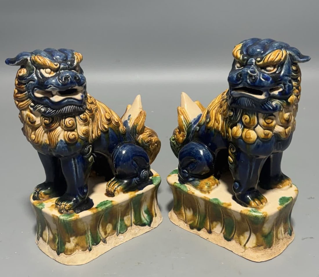A pair of Tang Sancai lion figurines: Tang Sancai lion figurine SIZE: H:23cm W:16cm (The Dimensions Of All Batches Are Manually Measured.If You Need More Detailed Information, Please Contact Our Customer Service Before Bidding.)