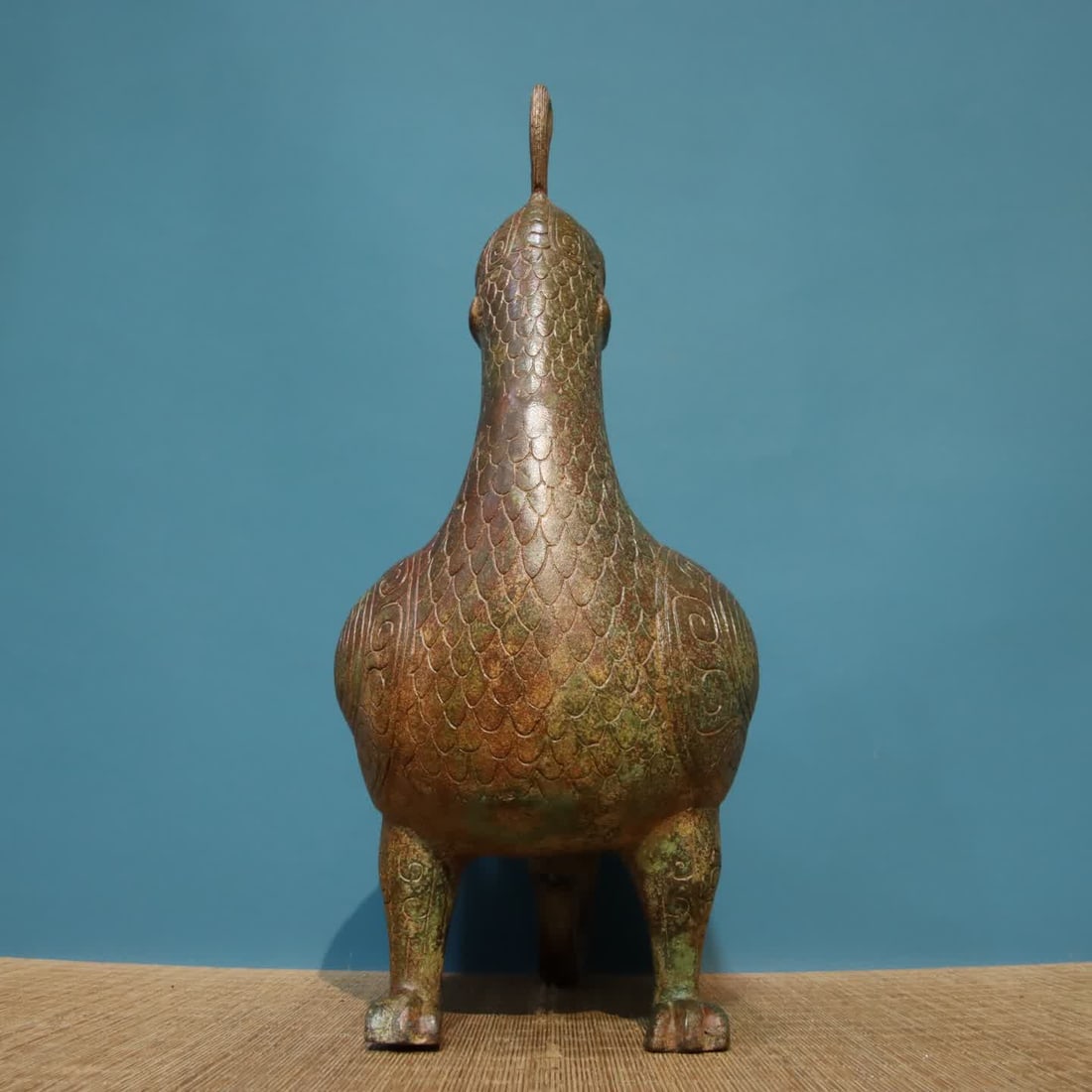A bronze bird statue - 2