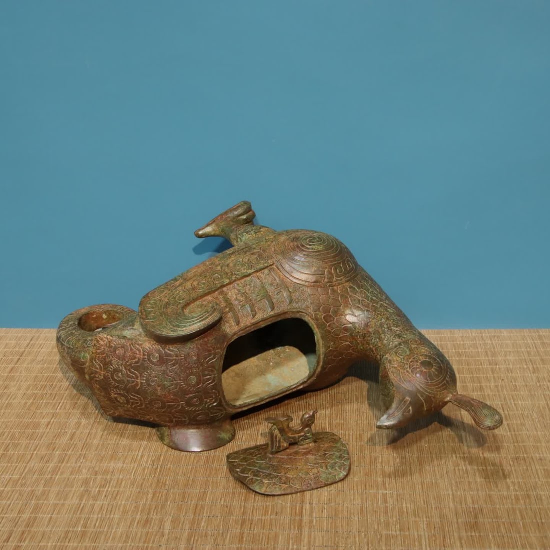 A bronze bird statue - 7