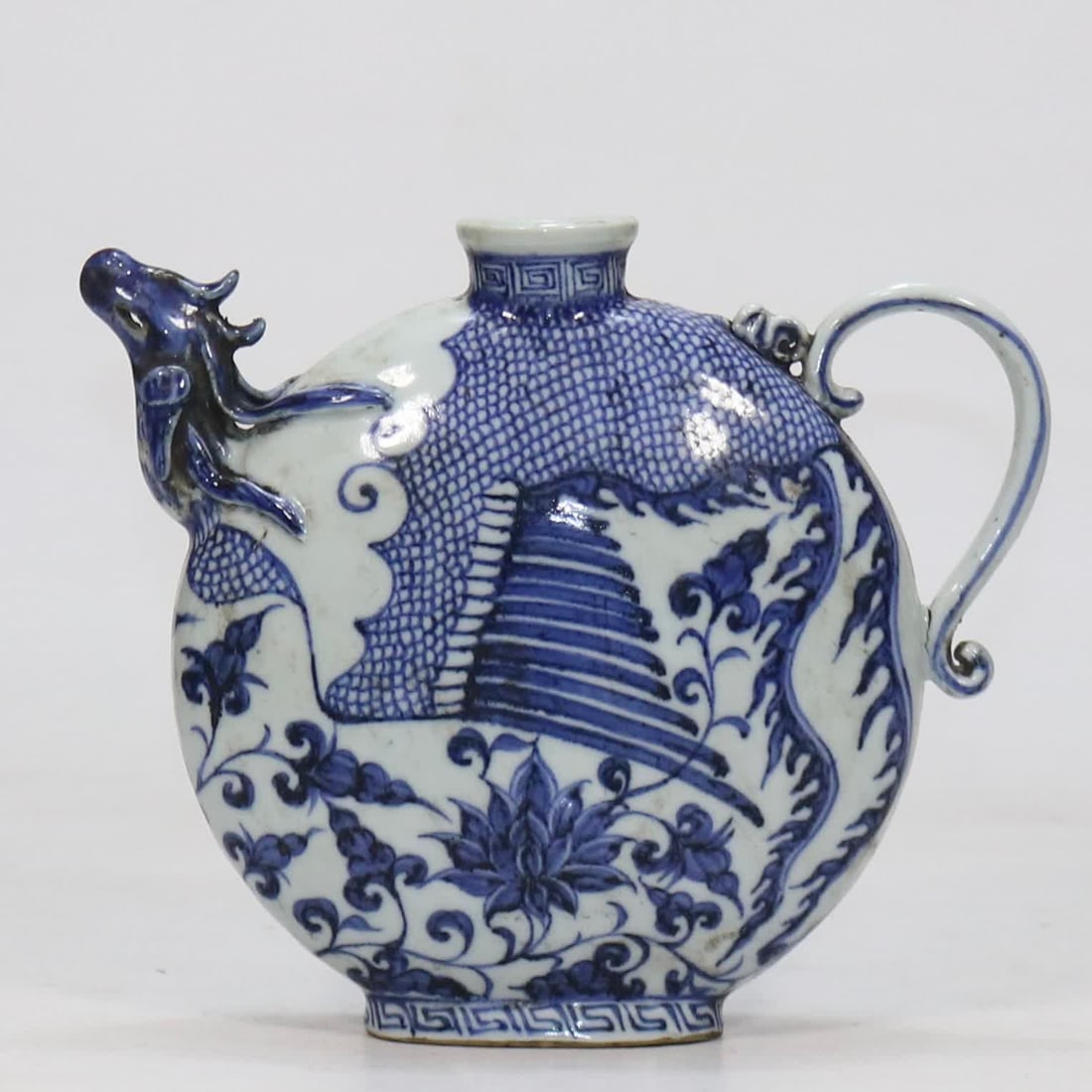 A Yuan blue and white phoenix head flat pot: The original blue and white phoenix head flat pot SIZE: H:18.2cm W:21cm (The Dimensions Of All Batches Are Manually Measured.If You Need More Detailed Information, Please Contact Our Customer Service