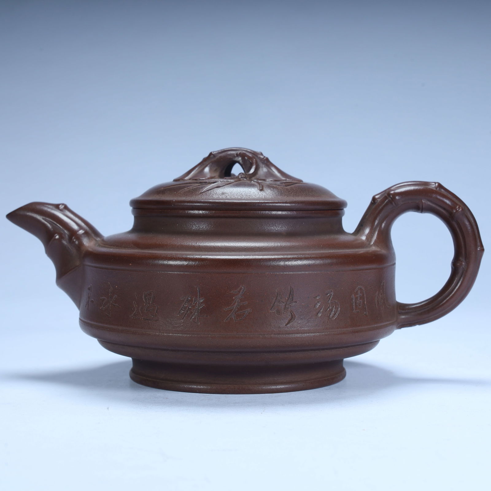 A Qing Dynasty purple sand bamboo poetry pot: Qing Dynasty purple sand bamboo festival poetry pot SIZE: H:9cm L:19cm W:12cm W:344.6g (The Dimensions Of All Batches Are Manually Measured.If You Need More Detailed Information, Please Contact Our Cu