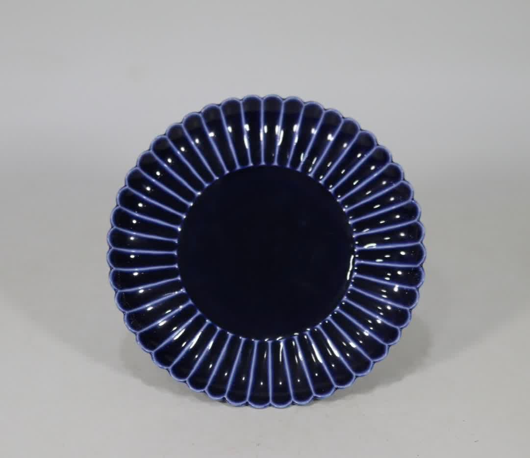 A blue-glazed chrysanthemum petal plate made in the Qianlong period of the Qing Dynasty: Qing Qianlong year sacrificial blue glaze chrysanthemum petal plate SIZE: D:17cm (The Dimensions Of All Batches Are Manually Measured.If You Need More Detailed Information, Please Contact Our Customer