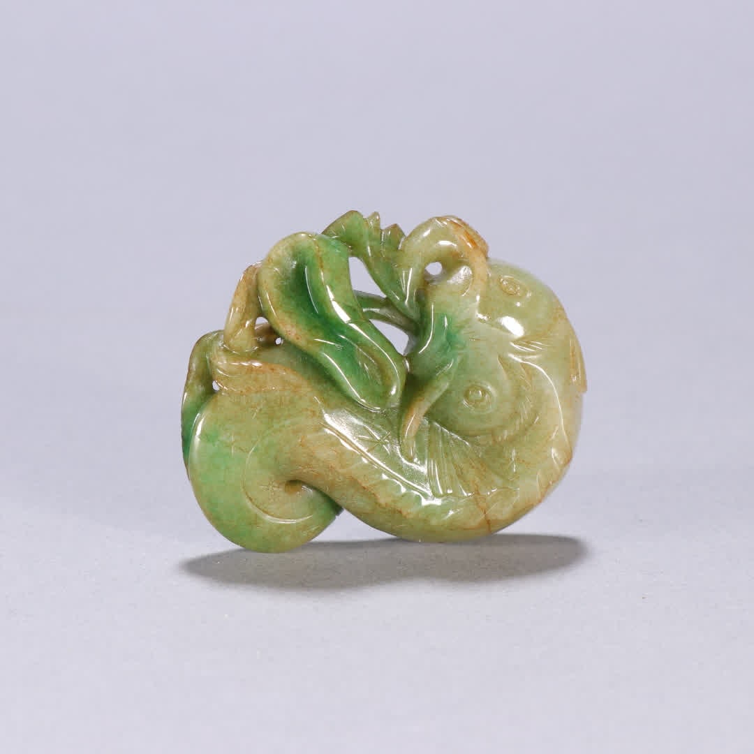 A Qing Dynasty jade loach carving: Qing Dynasty jade loach carving SIZE: H:5.3cm W:4.5cm W:51.4g (The Dimensions Of All Batches Are Manually Measured.If You Need More Detailed Information, Please Contact Our Customer Service Before Bid
