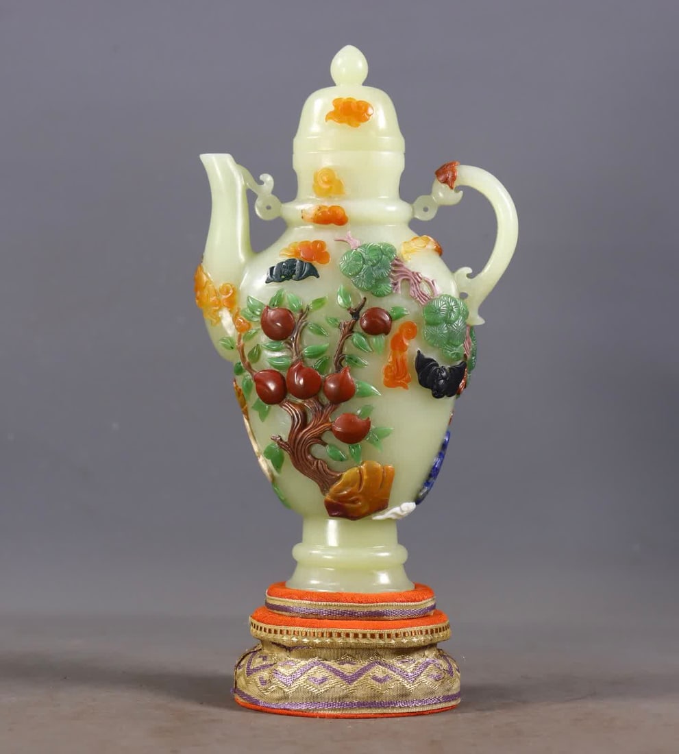 A Hetian jade eight-treasure inlaid pot: Hetian jade eight treasure inlaid pot SIZE: H:19.5cm L:11cm W:4.5cm W:418g (The Dimensions Of All Batches Are Manually Measured.If You Need More Detailed Information, Please Contact Our Customer Servi