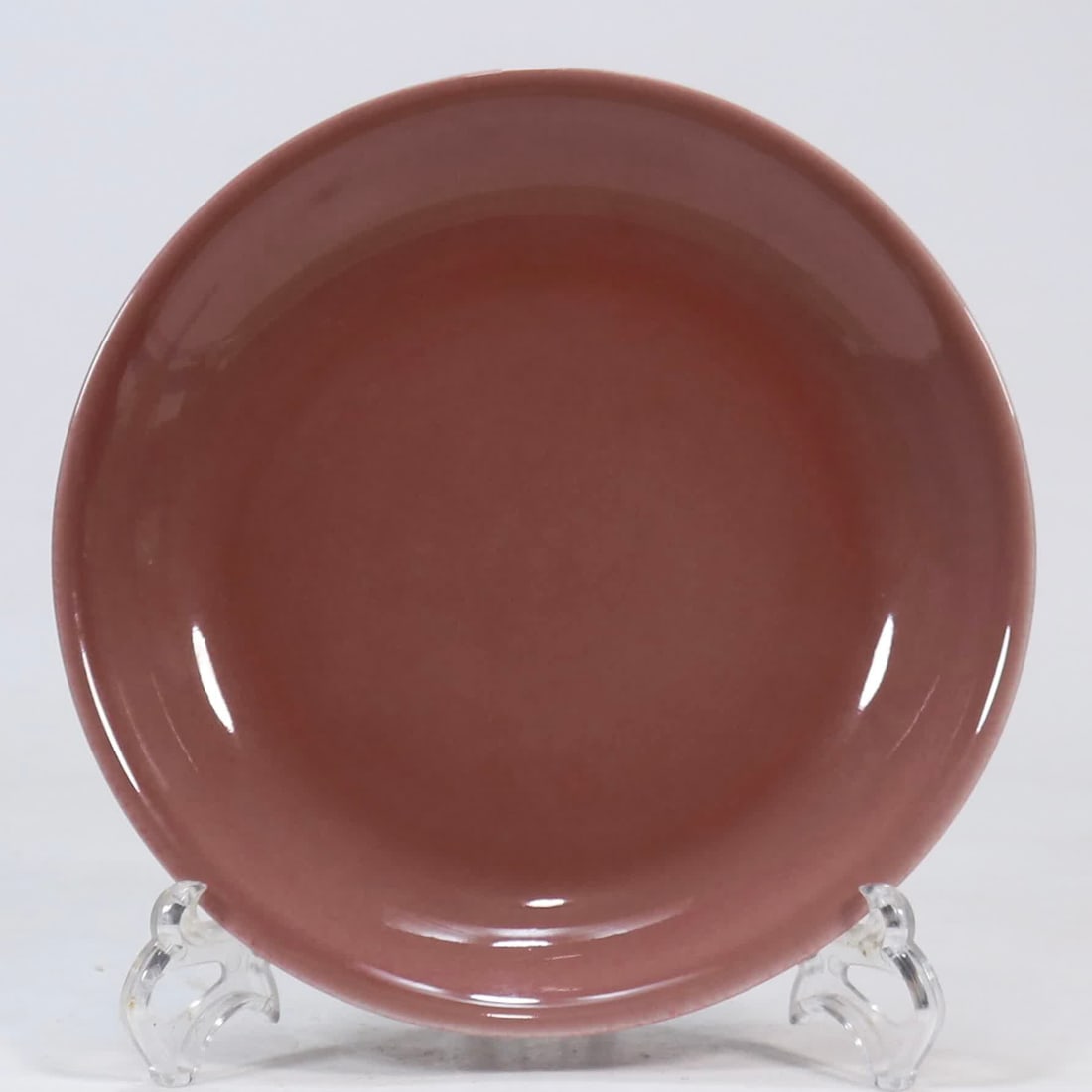 A piece of Qing Yongzheng year just put cowpea red glaze appreciation plate: Qing Yongzheng year system just general cowpea red glaze appreciation plate SIZE: H:3.8cm mouthD:20.8cm (The Dimensions Of All Batches Are Manually Measured.If You Need More Detailed Information, Plea