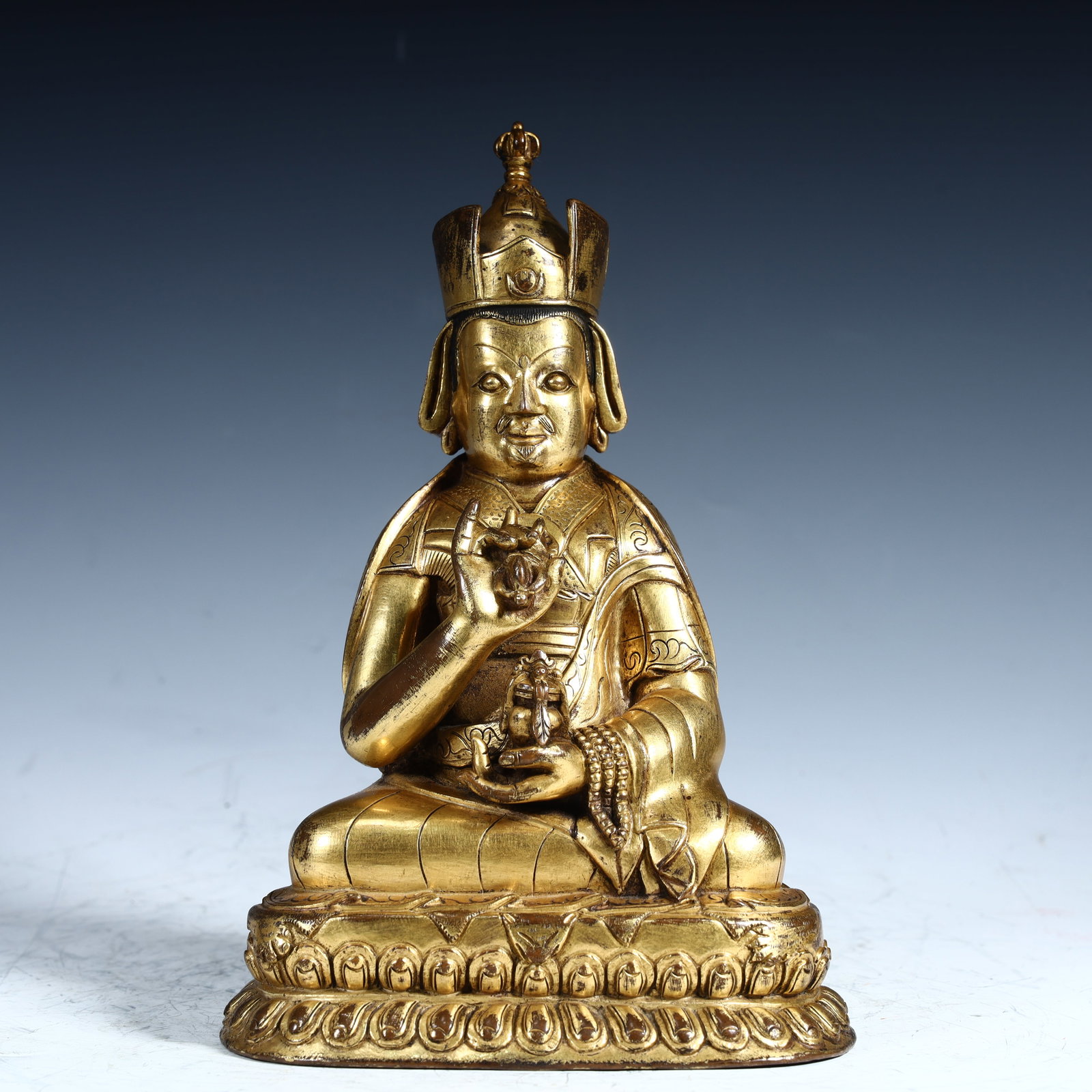 A Qing Dynasty copper-gilt golden lotus peanut Buddha statue: Qing Dynasty copper gilt lotus peanut Buddha statue SIZE: H:21.5cm L:14.3cm W:12.2cm W:1.7kg (The Dimensions Of All Batches Are Manually Measured.If You Need More Detailed Information, Please