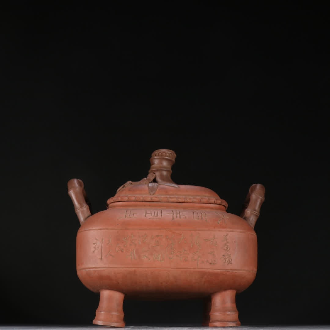 A Qing Dynasty golden tripod trademark model purple sand carved poetry tripod: Qing Dynasty Jinding trademark model purple sand carved poetry and literary tripod SIZE: H:16.6cm W:18cm (The Dimensions Of All Batches Are Manually Measured.If You Need More Detailed Information, Ple