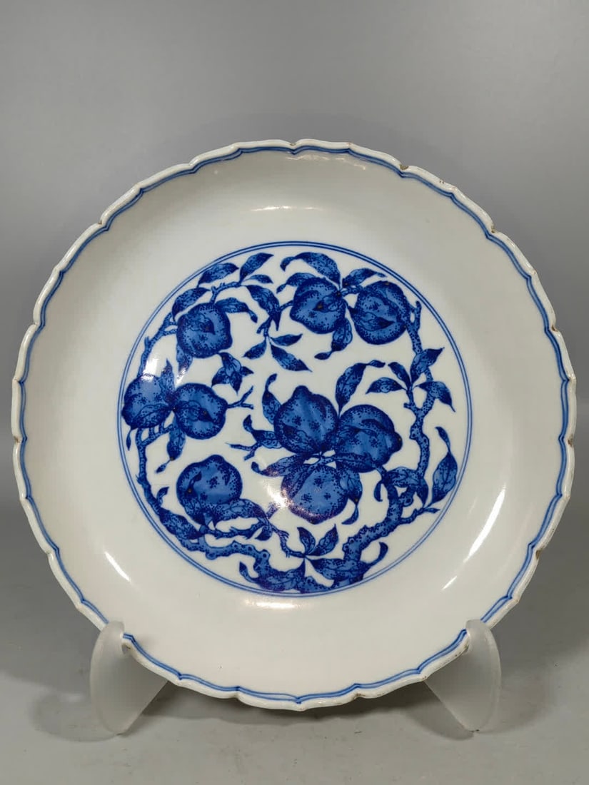 A Qing Dynasty blue and white peach plate: Qing Dynasty blue and white peach plate SIZE: H:5cm W:22cm (The Dimensions Of All Batches Are Manually Measured.If You Need More Detailed Information, Please Contact Our Customer Service Before Biddin